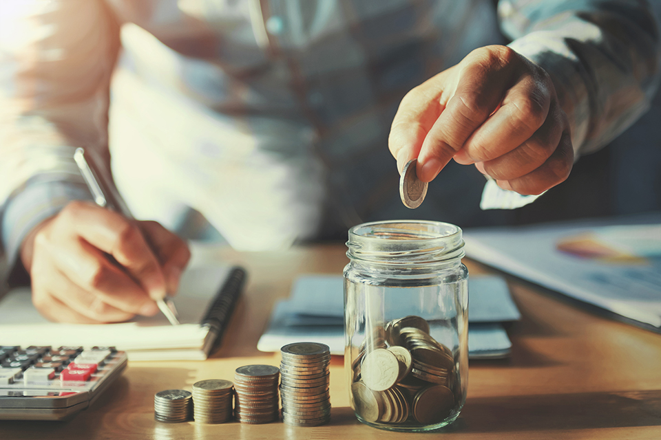 Image of counting coins. 