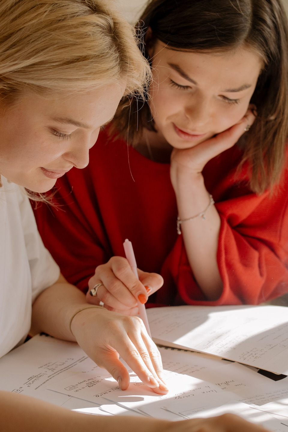 Two people working on a problem