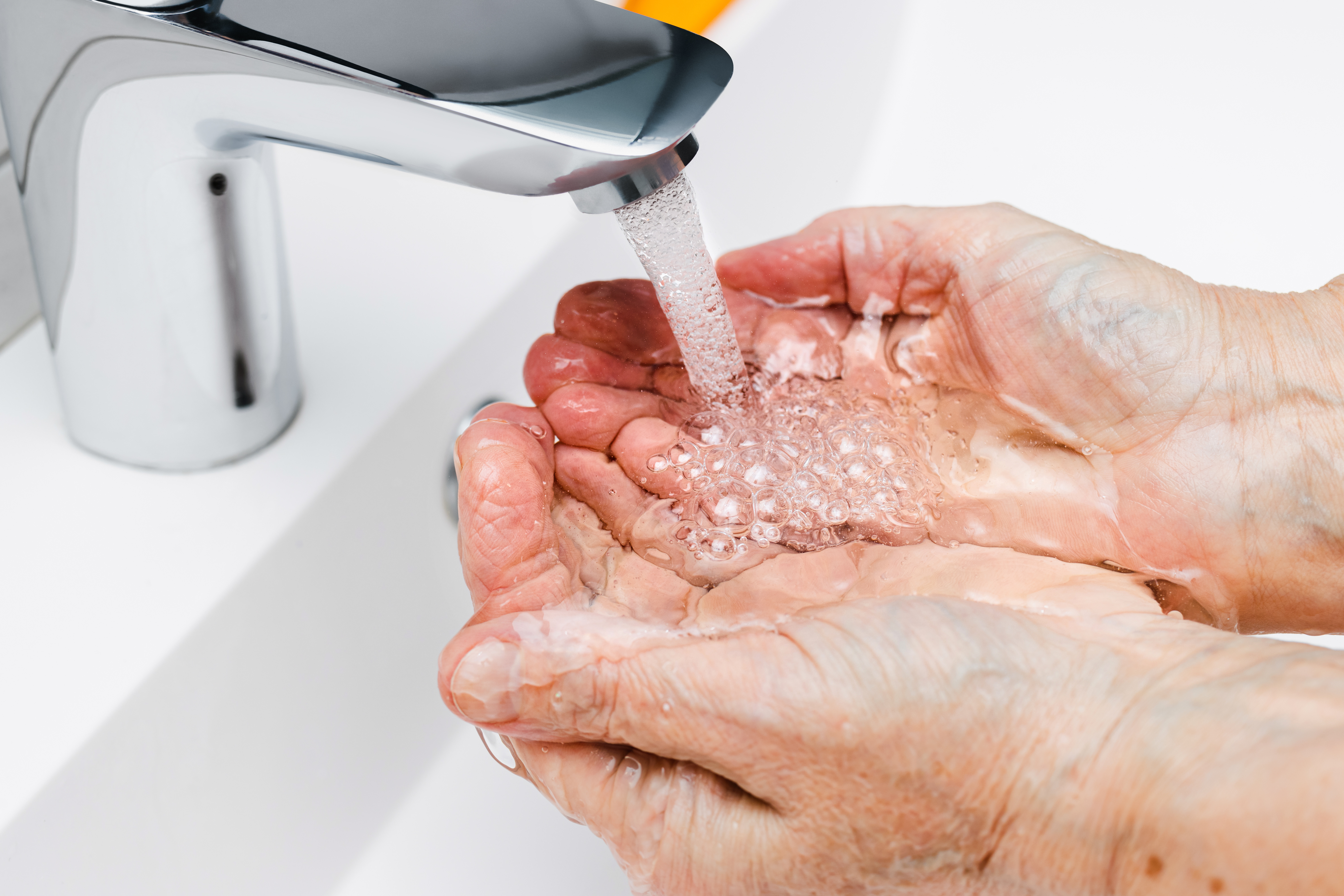 Tap turner device attached to a standard household tap – ideal for elderly parents with arthritis or reduced hand strength to turn taps on and off more easily and safely.
